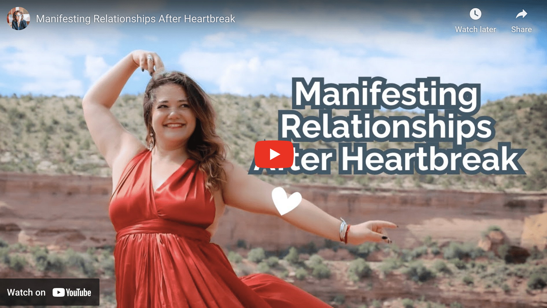 manifest relationship - photo of "better half to whole" founder on a hill in a red dress